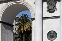 The great marble archway with plaques with a view of a palm tree in Valparaiso. Chile, South America.