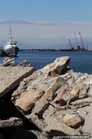 Chile Photo - Navy boat and the long jetty with cranes at the port in Coquimbo.