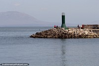 Chile Photo - Green lighthouse around the port area and seafront in Antofagasta.
