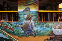 Verso maior do Produo de caf, artistas pintam lindos murais em Guatape.