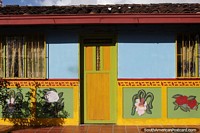 House skirting with flowers in Guatape.