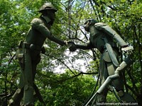 2 tin soldiers shaking hands, a monument at Parque Centenario in Cartagena. Colombia, South America.
