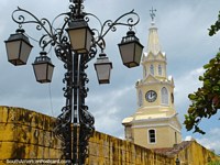 Streetlamps and the clock tower in Cartagena. Colombia, South America.