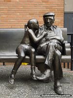 Colombia Photo - Girl and grandfather statue sitting on seat I saw in Medellin.