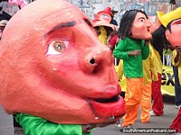 The dancing heads, people with big heads at Barranquilla Carnival. Colombia, South America.