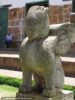A winged animal, stone statue near the cathedral in Barichara. Colombia, South America.