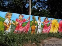 Colorful mural of dancers in traditional clothing in Valledupar.