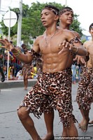 Young man with good abs, tiger pattern clothes, Festival of the Sea, Santa Marta. Colombia, South America.
