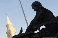 Larger version of Miguel de Cervantes Saavedra (1547-1616), poet and playwright and the clock tower in Cartagena.