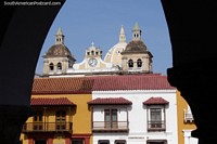 Clock, dome, tower tops, tiled roofs, balconies and arches, love Cartagena.