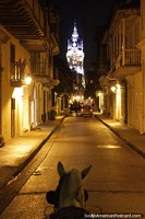 Along the street towards the cathedral at night by horse and cart, Cartagena. Colombia, South America.