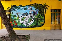 Mural de una enorme serpiente, una araña y una mariposa, en Leticia. Colombia, Sudamerica.