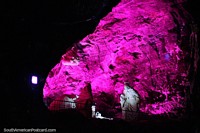 The Holy Family in pink light, part of the awesome light show at the Salt Cathedral in Zipaquira. Colombia, South America.