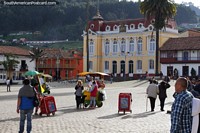 Big open and spacious plaza with handsome buildings surrounding in Zipaquira. Colombia, South America.