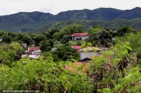 Colombia Photo - Green jungle and hills in Girardot, view from the old railway bridge.