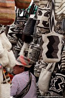 Large range of black and white Colombian shoulder bags at the Arts and Crafts Fair in Ibague. Colombia, South America.