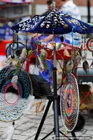 Jewelry, rings, earrings with feathers and dream catchers, for sale around Plaza Murillo in Ibague. Colombia, South America.