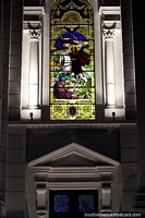 Larger version of Man with a sword on a white horse, stained glass window at the cathedral in Cali.