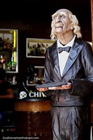 Waiter at the door at Trilogia Restaurant, San Antonio, Cali. Colombia, South America.