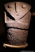 Carved from rock, a solitary figure on display at La Merced Archaeological Museum in Cali. Colombia, South America.
