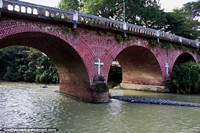 Around 1580 a local woman found a cross in the Guadalajara River in Buga that grew and became revered by the townspeople. Colombia, South America.