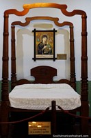 Larger version of Mrs Gabriela Sarmientos bed with the anagram of her first and last name at the Lord of the Miracles Museum in Buga.