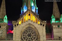Lights and colors of the cathedral light-up Plaza Bolivar at night in Manizales. Colombia, South America.