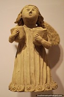 Ceramic angel holding pots, Antioquia Museum, Medellin. Colombia, South America.