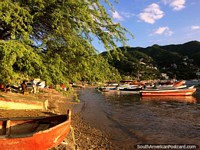 Beautiful light in the bay of Taganga at the end of the day, boats and hills. Colombia, South America.