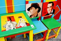 Larger version of Agustin Magaldi (1898-1938) - a tango singer and Hugo del Carril (1912-1989) - an actor, colorful chairs in Jardin.