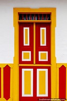 The bright colored doors in Salento are something to see while exploring the streets. Colombia, South America.