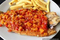Larger version of Hawaiian trout meal with fresh fish, pineapple and vegetables, delicious food in Salento.