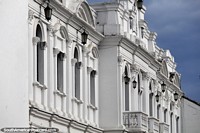 Larger version of Beautiful and intricate white facade with black lanterns in the white city of Popayan.