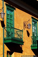 Colombia Photo - Beautiful orange building with green balconies and doors in La Candelaria in Bogota.