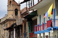 Colombia Photo - An old brick bell tower and colorful wooden balconies in central Bogota.