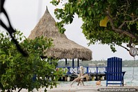 La Isla Tintipán ofrece un entorno agradable para relajarse junto a las aguas del Golfo de Morrosquillo. Colombia, Sudamerica.