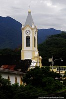 The church beside General Santander Park in Mocoa with clock tower. Colombia, South America.
