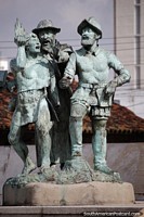 Larger version of 3 men, one with book, one with knife, one with spear, monument in Bucaramanga.