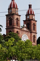 View of the cathedral in Barrancabermeja from down by the river, 2 tall towers. Colombia, South America.