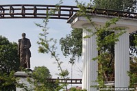 Bolivar Park (1931/37) in Barrancabermeja with statue of Simon Bolivar and white columns. Colombia, South America.
