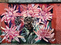 2 pessoas com os olhos fechados e rodeados de rosas vermelhas, arte de rua em Pasto. Colmbia, Amrica do Sul.