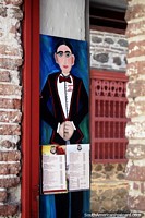 Pintura e cardápio na entrada do Restaurante El Porton del Parque em Santa Fe.