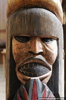 Carved wooden face on display at the museum in Mocagua near Leticia. Colombia, South America.