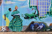 Dancing, soccer, iguanas, crabs - a beautiful mural in Necocli.