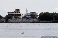 Banks of the river and the white church in El Banco.