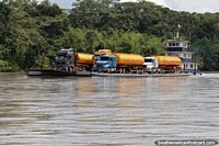 Tugboat pushes petrol tankers on a barge along the Napo River between Rocafuerte and Coca.