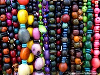 Larger version of Necklaces and beads made of seeds in amazing colors, Otavalo.