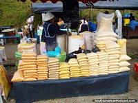 Bags of corn, bran and rice at Otavalo markets. Ecuador, South America.