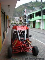 Larger version of A cool looking buggy for rent on the sidewalk in Banos.