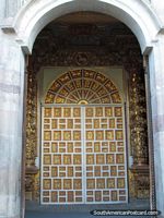 Golden door of church in Quito.